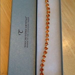ISO-  tangerine ice bracelet by Touchstone Crystal